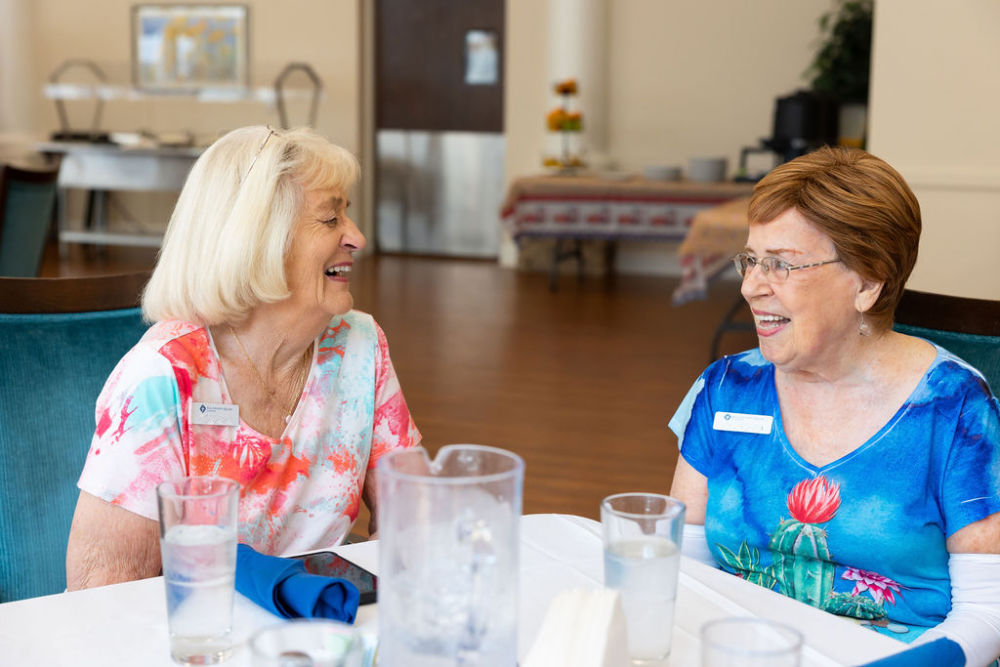 Ladies Laughing At Brunch 1000Px