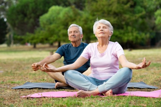 Seniors practicing Yoga at Fellowship Square Senior Living in AZ