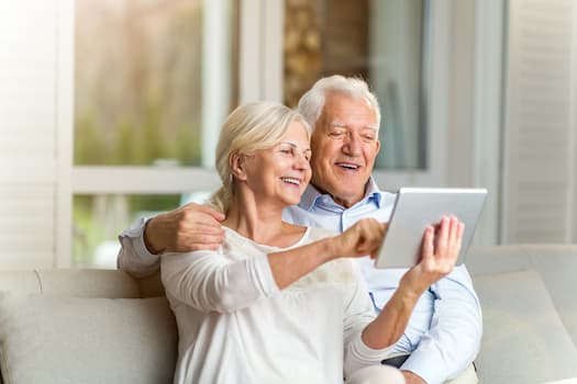 couple looking at tablet together