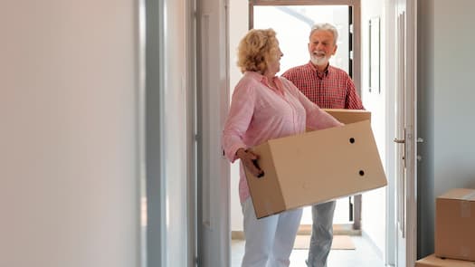 Couple moving boxes